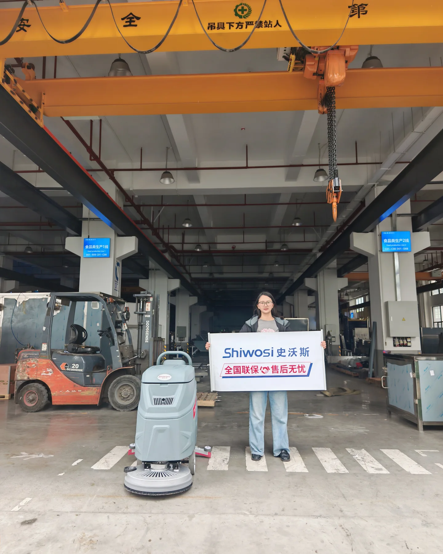 Walk-Behind Floor Scrubber at a Cryogenic Equipment Factory