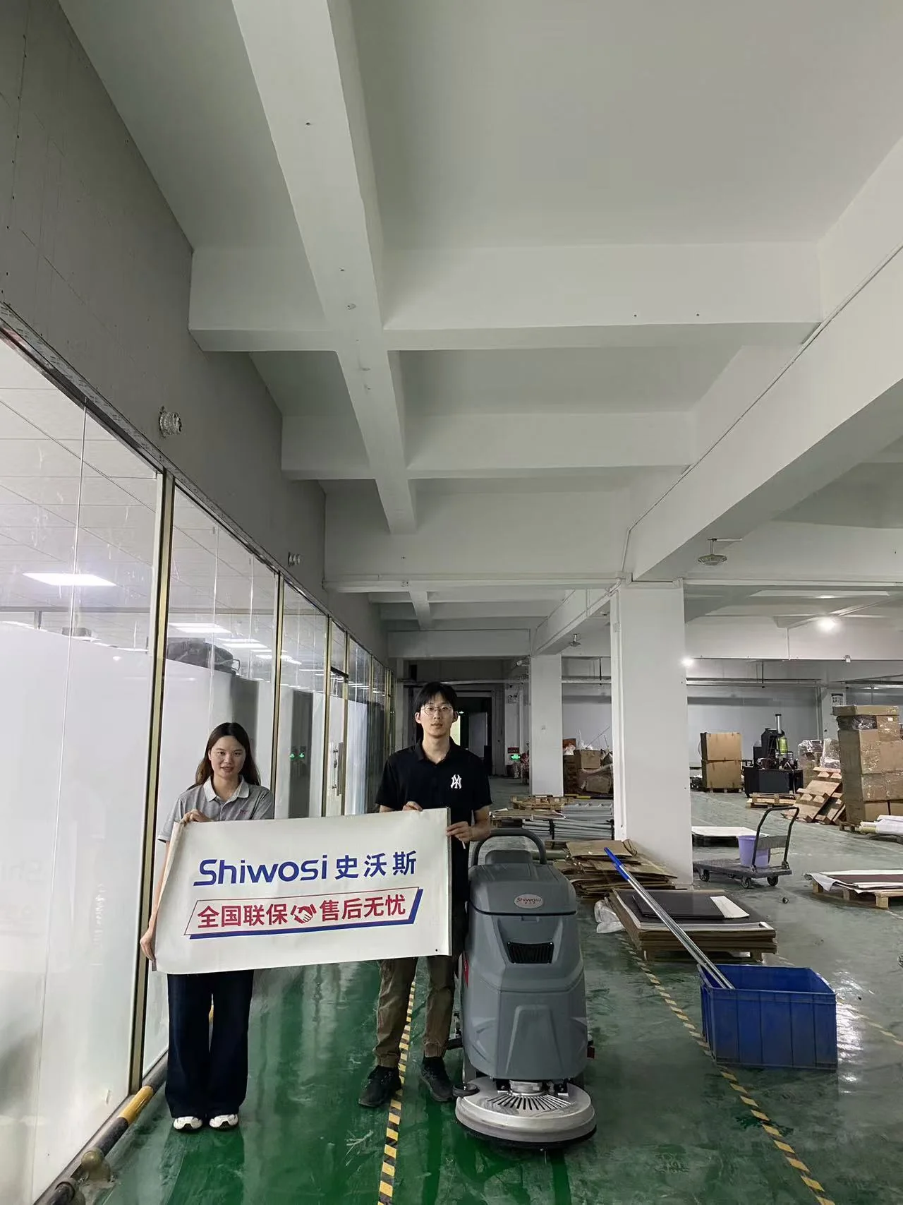 Walk-Behind Floor Scrubber at a Packaging and Printing Plant